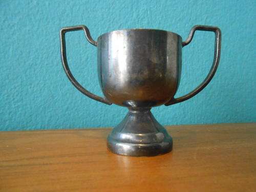 Small Vintage Metal Trophy (Stands 4cm tall) Has no markings