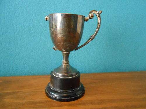 Vintage Trophy with a missing arm (Stands 11cm tall)