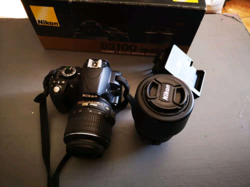 Nikon D3100 + 18-55 mm DX lens original charger and Box only + 6 Months Warranty