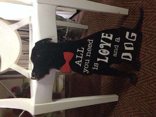 Metal dog sign