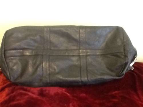 A Beautiful Black Leather Holdall.