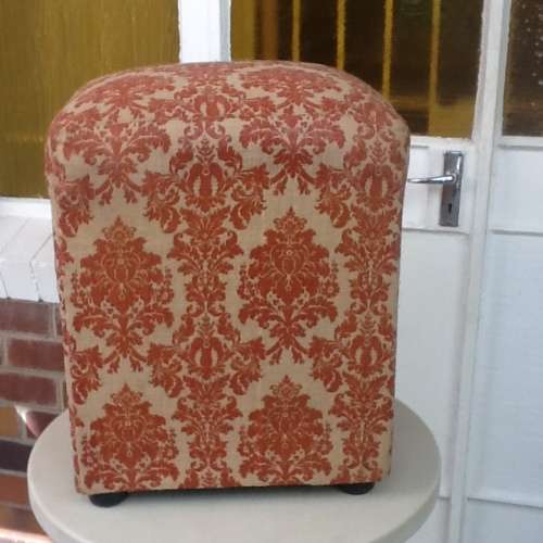 An Ottoman Newly Upholstered.