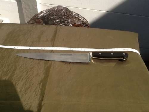 A Chef Collection Stainless-Inox-Rostfrei Carving Knife.