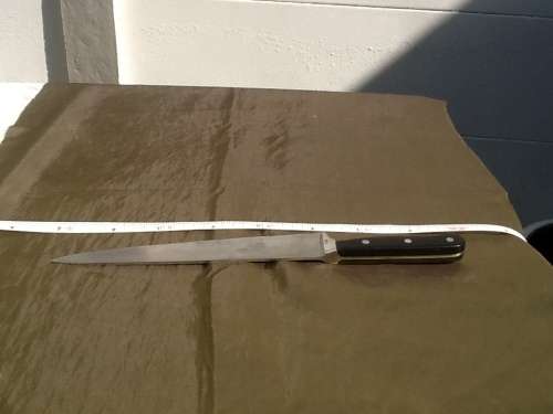 A Chef Collection Stainless-Inox-Rostfrei Carving Knife.