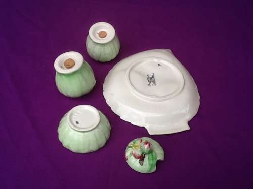 A Carltonware Salt, Pepper and Mustard Set in Green with Stand.
