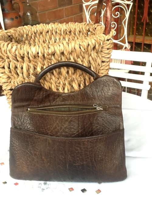 A Small Handbag in Elephant Skin.