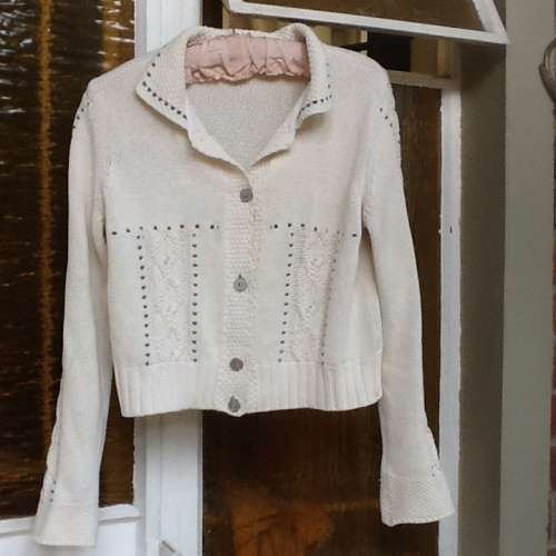 A Cream/White Cardigan.  United Colours of Beneton. Large.