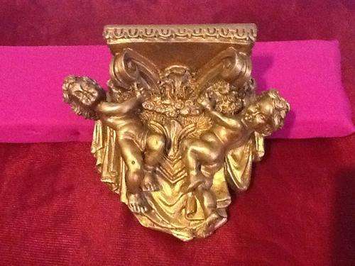 Small Gilded Wall Plaque with Cherubs.