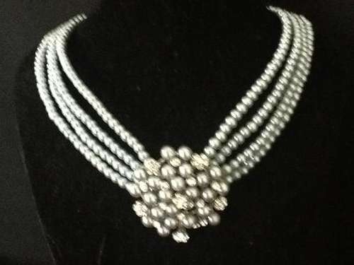 A Beautiful Pearl and Dumont Necklace.