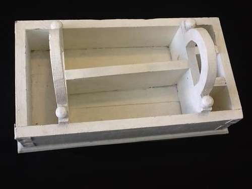 A White Wooden Cutlery Box.