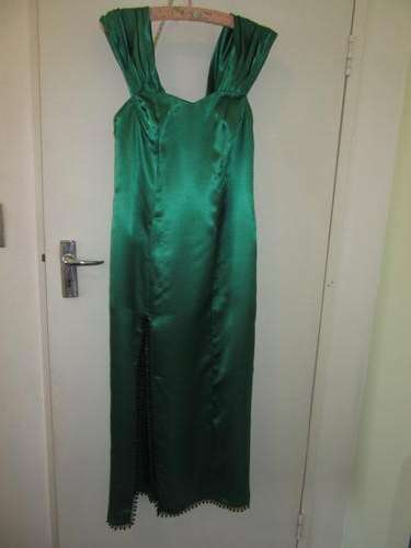 A Long Green Satin Dress.