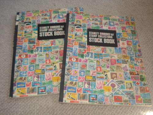 WORLD COLLECTION IN TWO STOCK BOOKS-ANYTHING COULD BE IN THESE !! READ BELOW