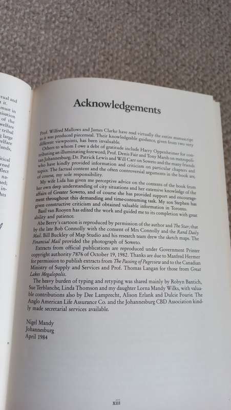 A CITY DIVIDED-JOHANNESBURG AND SOWETO-SIGNED BY NIGEL MANDY