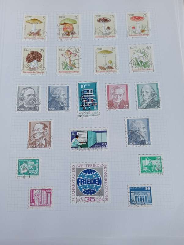 PART 1    DDR-STUNNING COLLECTION ON 15 STANLEY GIBBONS PAGES-MOSTLY COMPLETE M/U