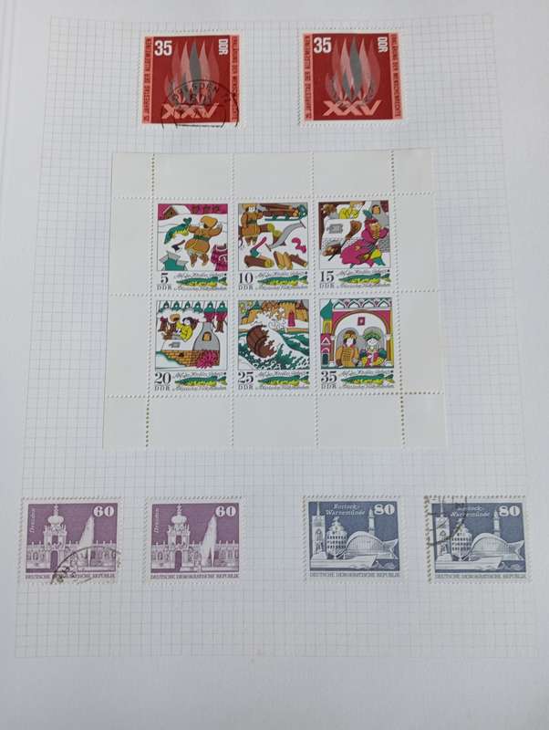 PART 1    DDR-STUNNING COLLECTION ON 15 STANLEY GIBBONS PAGES-MOSTLY COMPLETE M/U