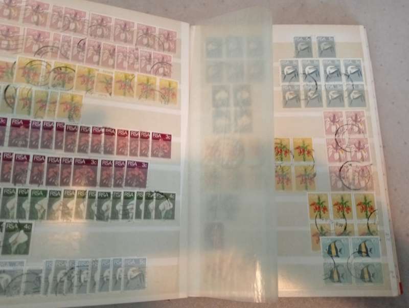 STOCK BOOK-RSA  FULL OF USED BLOCKS, SINGLES.DUES AND OTHERS-FINDS NO DOUBT !! NOT NEARLY ALL SHOWN