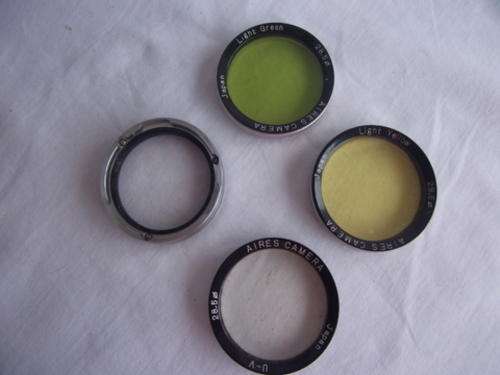 LITTLE LEATHER BOX OF FOUR LENSES