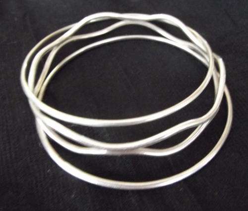 THREE STERLING SILVER BANGLES - A LOVELY SET