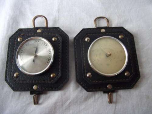 A LOVELY VINTAGE LEATHER FRAMED BAROMETER AND THERMOMETER SET - SEEMS TO BE WORKING PERFECTLY.