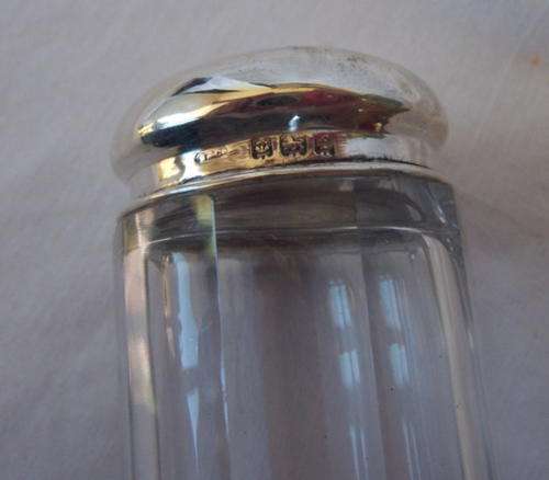PRETTY HALL MARKED SILVER AND CRYSTAL VANITY BOTTLE - WITH AN ANGEL STAMPED ON THE TOP - MADE I