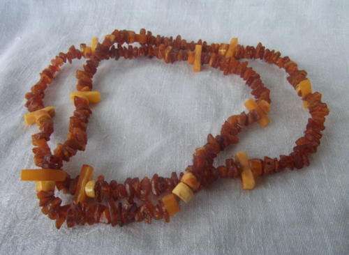 A REALLY BEAUTIFUL STRING OF BALTIC AMBER - LARGE CHIPS AND BEADS MIXED