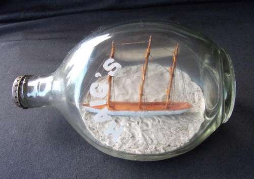 HOW DO THEY DO THIS?? A SHIP IN A HAIG'S BOTTLE