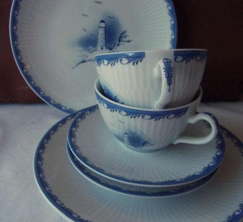 TWO EGGSHELL FINE SCHIRNDING GERMAN BONE CHINA TRIOS