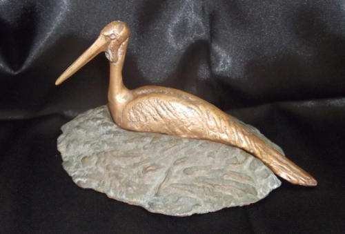 LOVELY BRONZE OF A STORK ON HER NEST BY K. CALDER