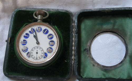 LARGE TRAVELING CLOCK IN A HALLMARKED SILVER CASE. WORKING AND GOOD CONDITION