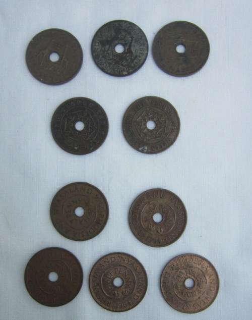10 x Rhodesia and Nyasaland half pennies.