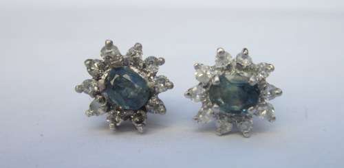 Lovely little tourmalines surrounded by white sapphires set in sterling silver studs.