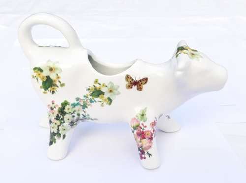Sweet German porcelain milk jug covered in flowers