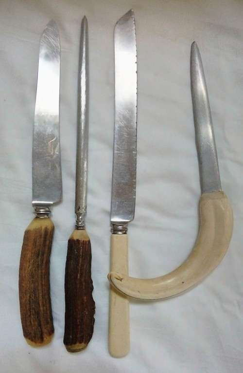 2 knifes, a sharpener and a letter opener,   horn and warthog tusk