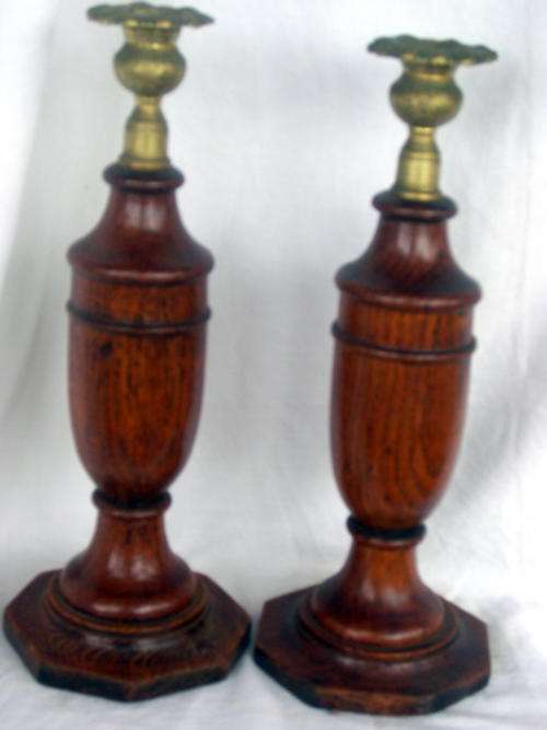 PAIR OF TURNED OAK AND BRASS CANDLESTICKS