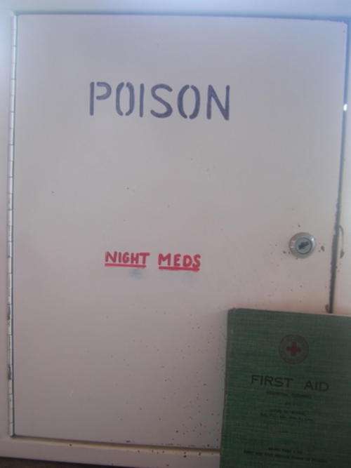 WACKY!STEEL POISON AND/OR MEDICINE CABINET??? YOU DECIDE!!! COMES WITH FIRST AID BOOK 1942