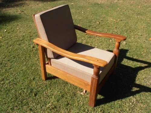 A stylish solid Morris chair with cushions, (one of three available)