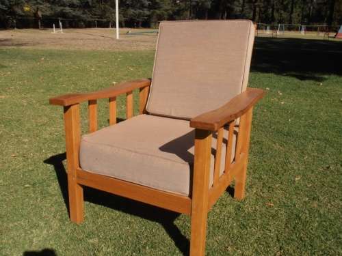 A lovely solid Morris chair with cushions, (one of three available)