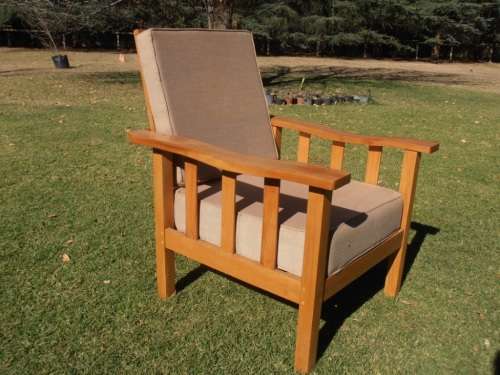 A lovely solid Morris chair with cushions, (one of three available)