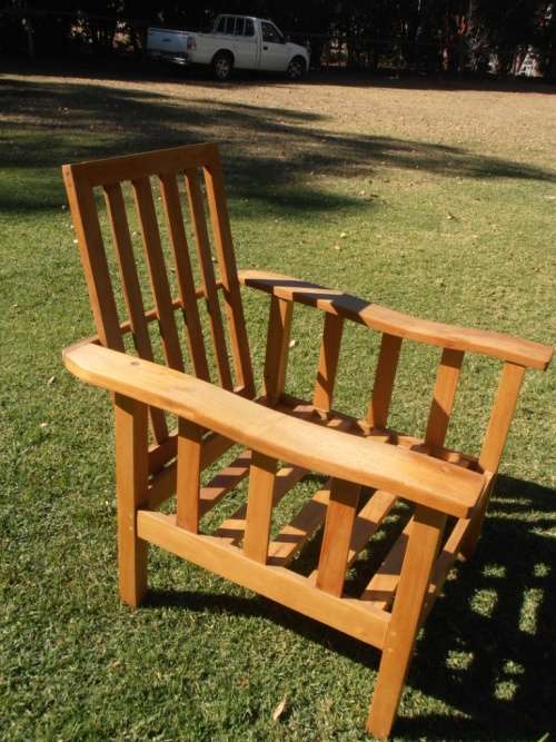 A lovely solid Morris chair with cushions, (one of three available)