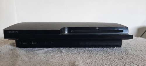 PS3 Slim Cech-2504B with 1TB HDD with 40 games on drive.