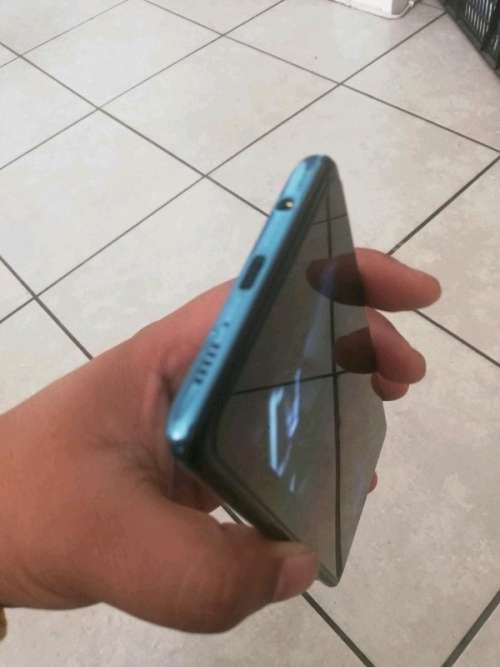 Samsung Galaxy A51 with all accessories and 3 pouches.