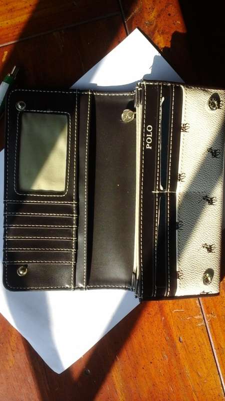 Lovely genuine Polo clutch purse.