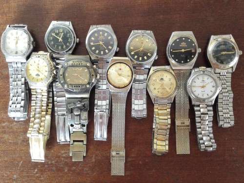 ORIENTEX WATCH LOT- ALL WORKING. 1 BID TAKES ALL!!
