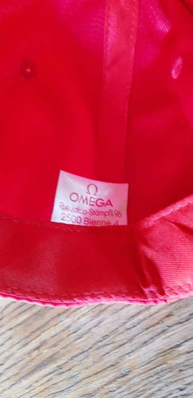 BRAND NEW GENUINE OMEGA CAP AND PEN IN GIFT BAG