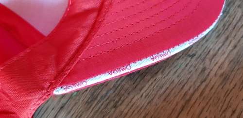 BRAND NEW GENUINE OMEGA CAP AND PEN IN GIFT BAG