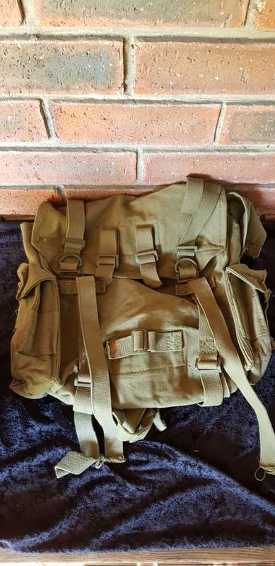 ARMY RUCKSACK AND HELMET- HIGHEST BID TAKES BOTH