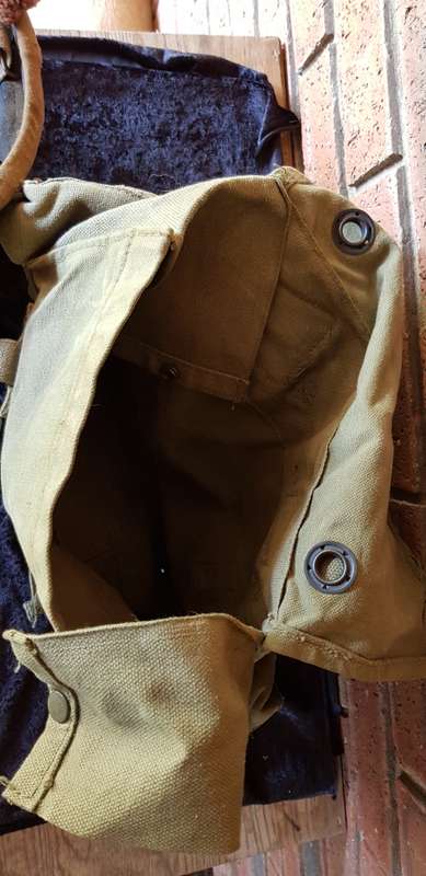 ARMY RUCKSACK AND HELMET- HIGHEST BID TAKES BOTH