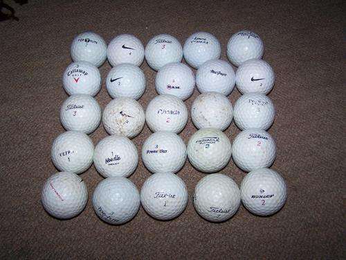 25 Golf Balls in various condition.
