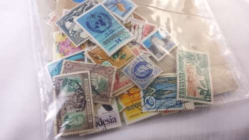 Rhodesian stamps packet of 48+/- stamps
