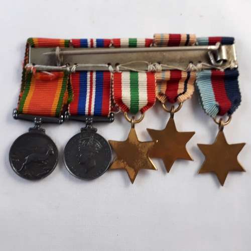WW2 GROUP OF 5 MEDALS & 5 MINIATURES WITH PAPER WORK TO R.A.F ENGINEER